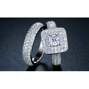 Get Double Princess Cut Cubic Zirconia Engagement Ring Set For $15.99 At Groupon.com